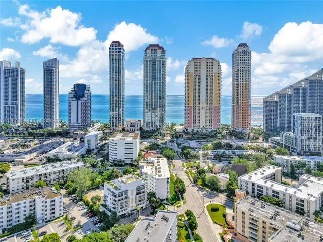 a view of a city with tall buildings