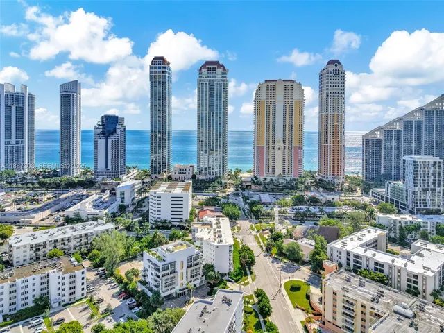 a view of a city with tall buildings