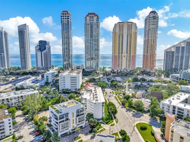 a large building with a city view
