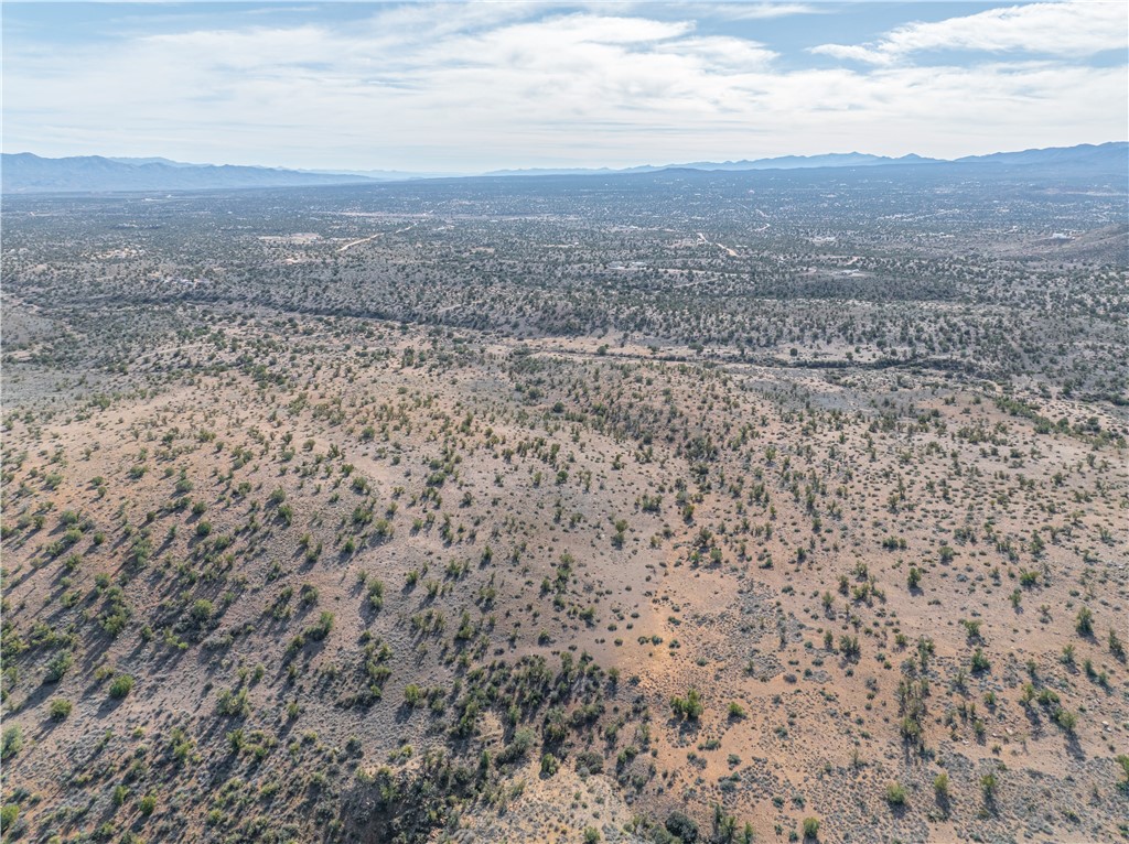 3207 Stetson Road Kingman, AZ 86401 - Photo 11 of 11 Overview of rural landscape with mountains and a desert landscape
