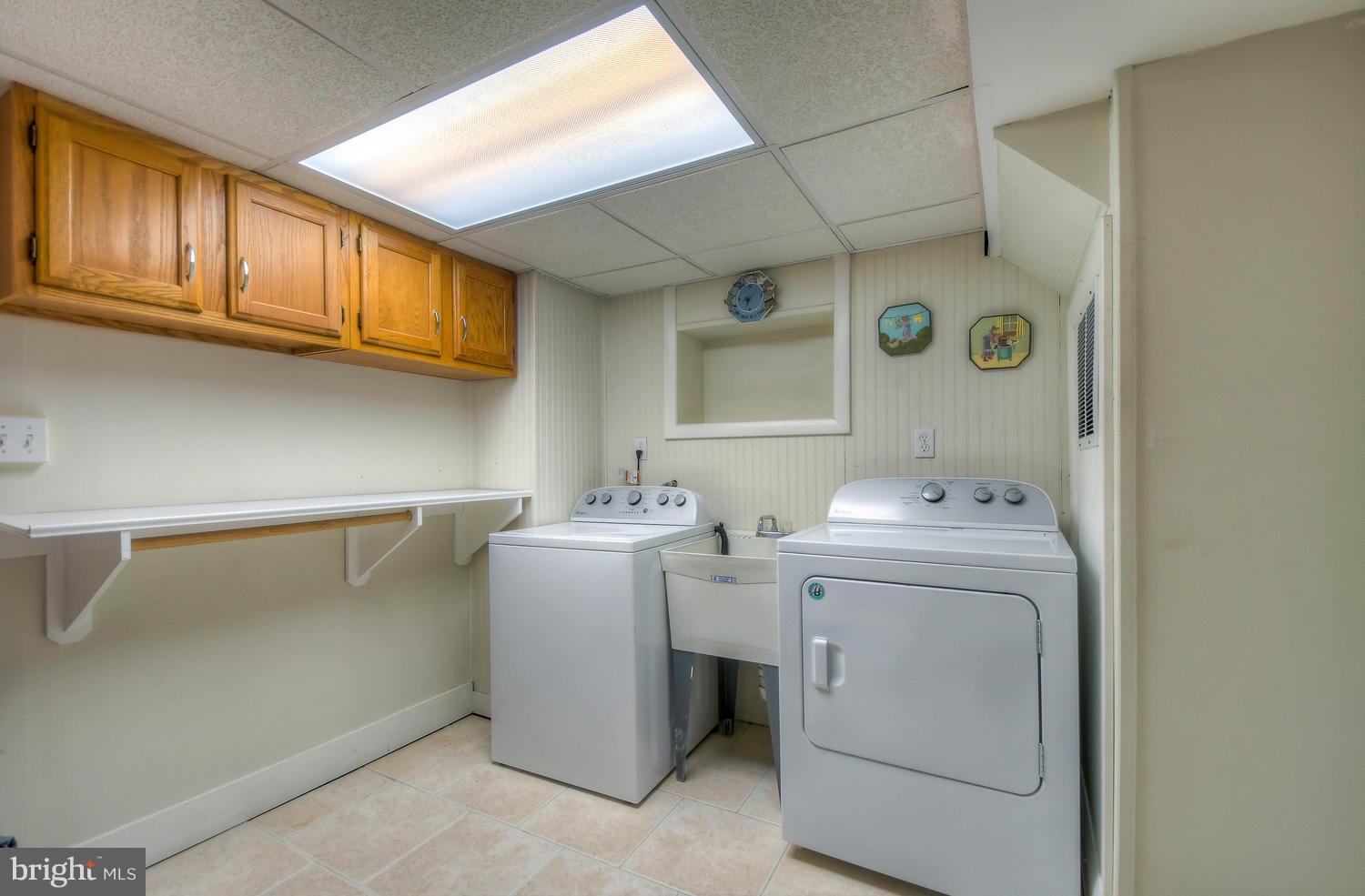 322 Upperlanding Road Baltimore, MD 21221 - Photo 32 of 37 a utility room with dryer and washer