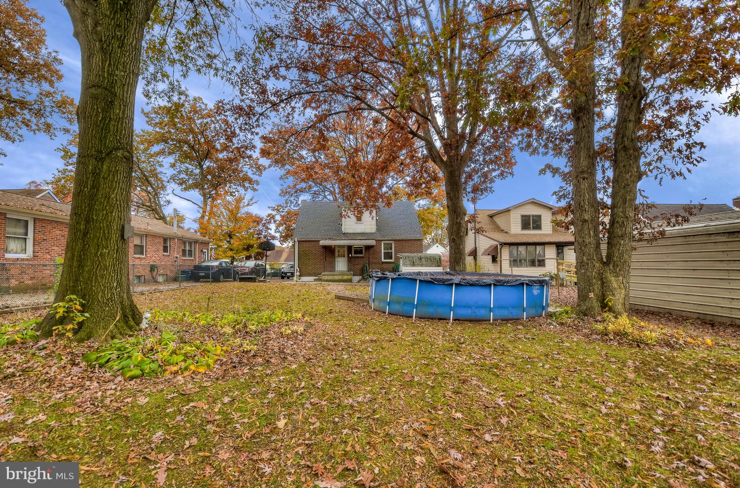 322 Upperlanding Road Baltimore, MD 21221 - Photo 36 of 37 a view of a house with swimming pool next to a yard