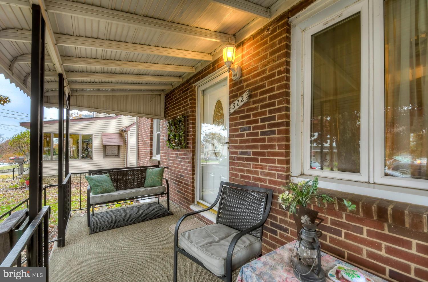 322 Upperlanding Road Baltimore, MD 21221 - Photo 6 of 37 a balcony with furniture and a potted plant