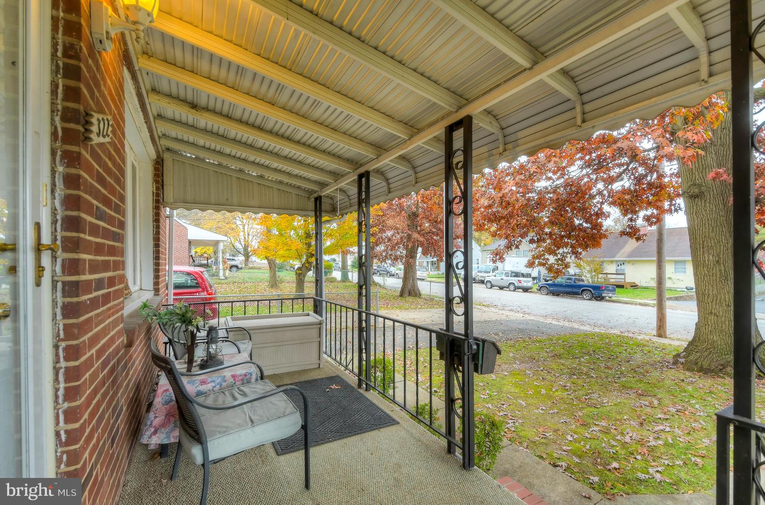 322 Upperlanding Road Baltimore, MD 21221 - Photo 7 of 37 a view of a porch with furniture and garden