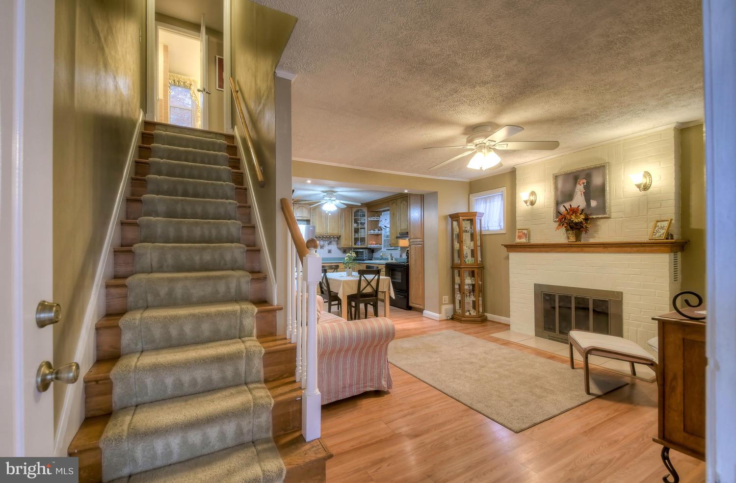 322 Upperlanding Road Baltimore, MD 21221 - Photo 8 of 37 a view of a livingroom with furniture and staircase