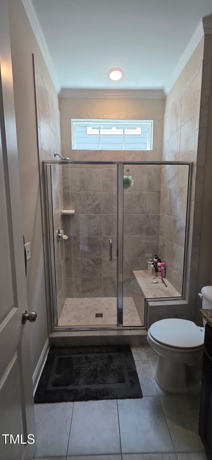 1656 Silo Ridge Drive Wake Forest, NC 27587 - Photo 12 of 17 a bathroom with a shower and a toilet