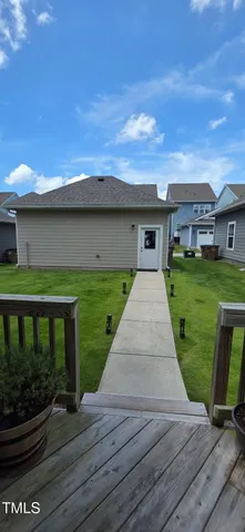 a front view of house with outdoor space