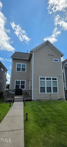 a house view with a garden space