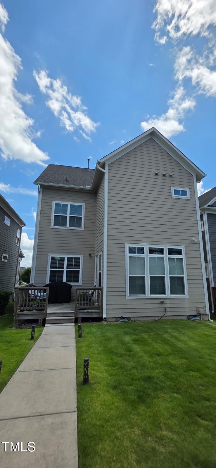1656 Silo Ridge Drive Wake Forest, NC 27587 - Photo 14 of 17 a house view with a garden space