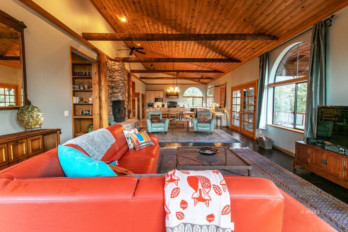 54850 Chipmunk Drive Idyllwild, CA 92549 - Photo 14 of 44 a living room with blue lights with furniture