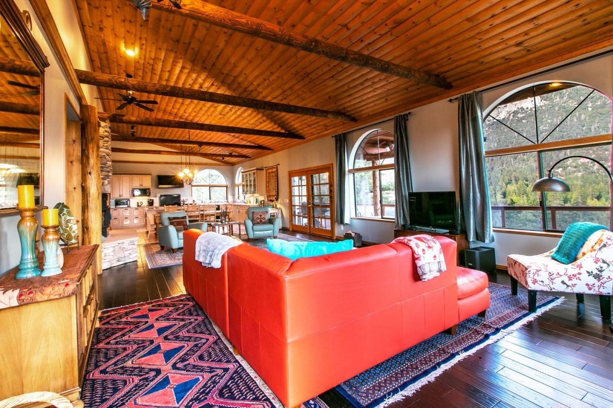 54850 Chipmunk Drive Idyllwild, CA 92549 - Photo 16 of 44 a room with furniture and a chandelier