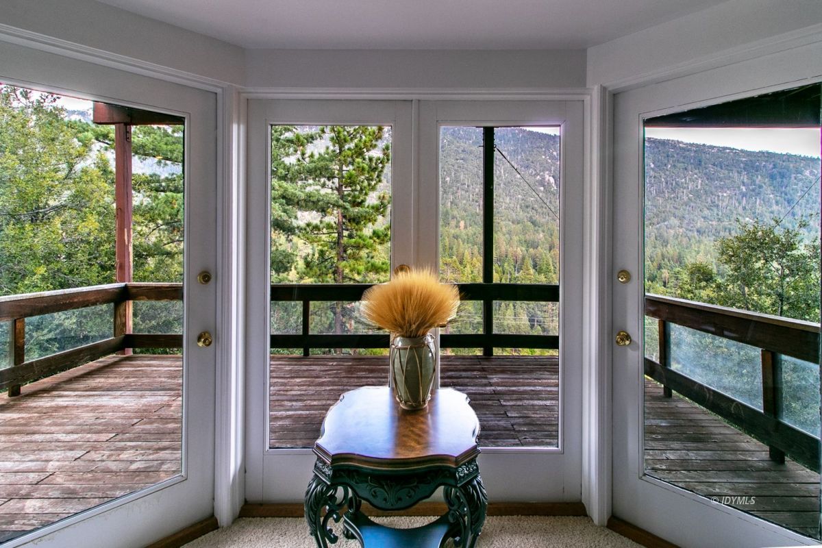 54850 Chipmunk Drive Idyllwild, CA 92549 - Photo 34 of 44 a room with furniture and wooden floor