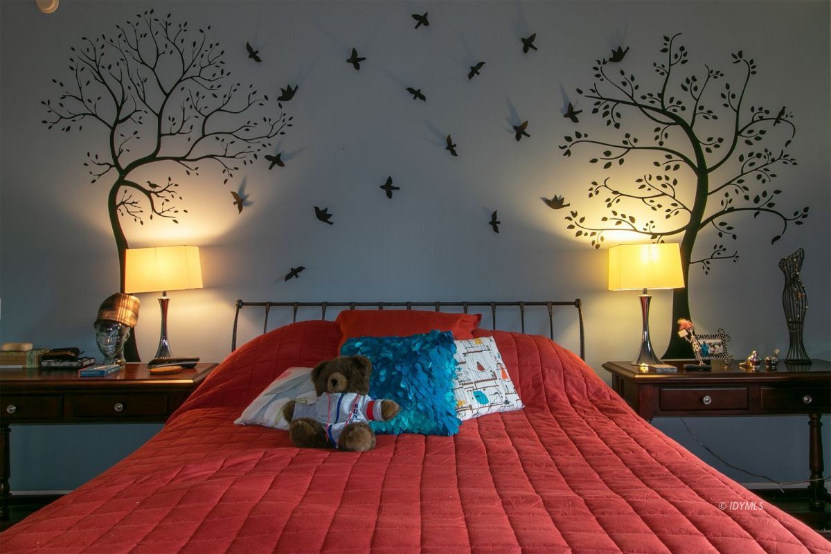 54850 Chipmunk Drive Idyllwild, CA 92549 - Photo 37 of 44 a bed room with a bed and a night stand