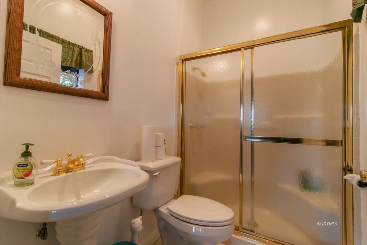54850 Chipmunk Drive Idyllwild, CA 92549 - Photo 38 of 44 a bathroom with a sink toilet and shower