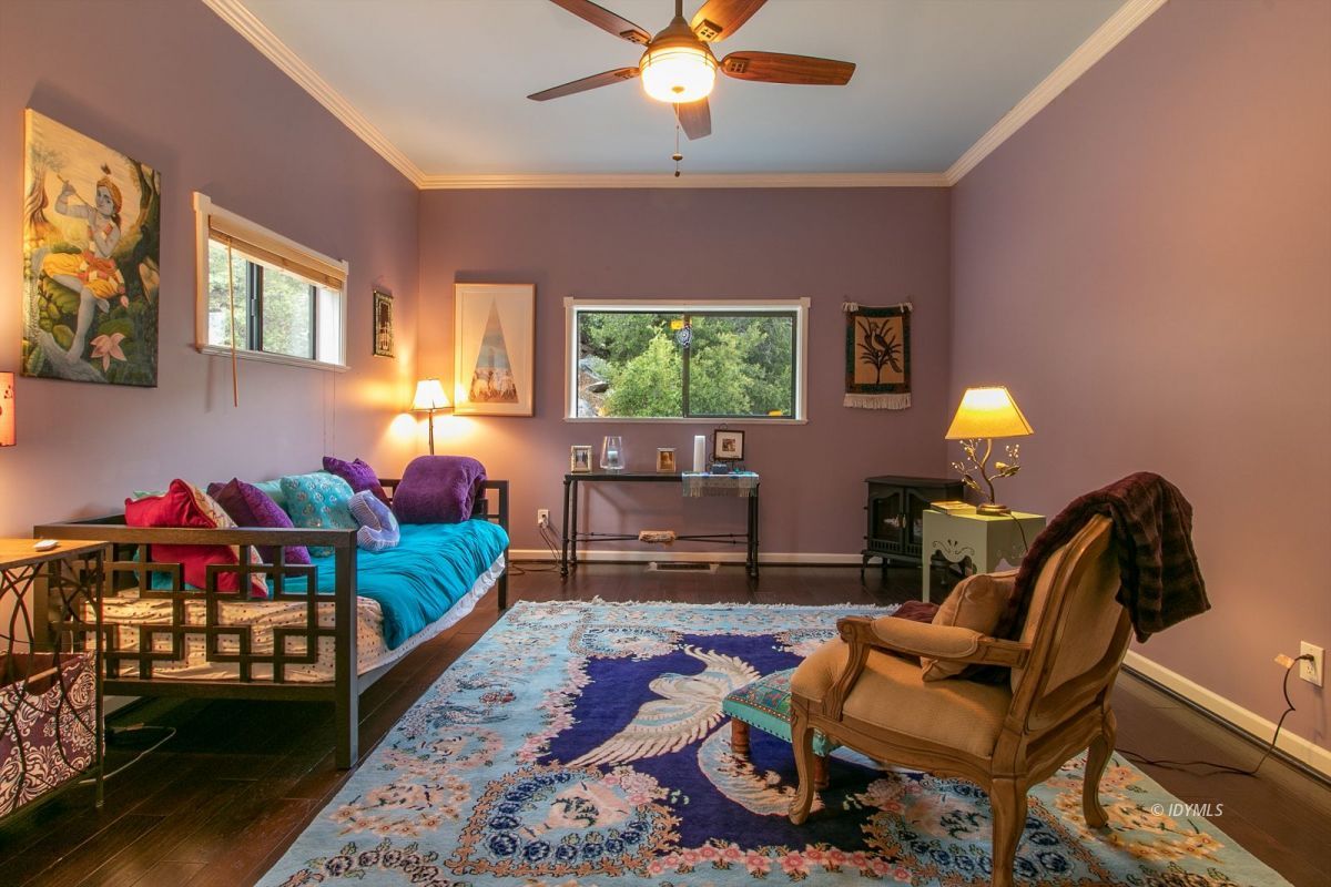 54850 Chipmunk Drive Idyllwild, CA 92549 - Photo 39 of 44 a living room with furniture a window and a flat screen tv