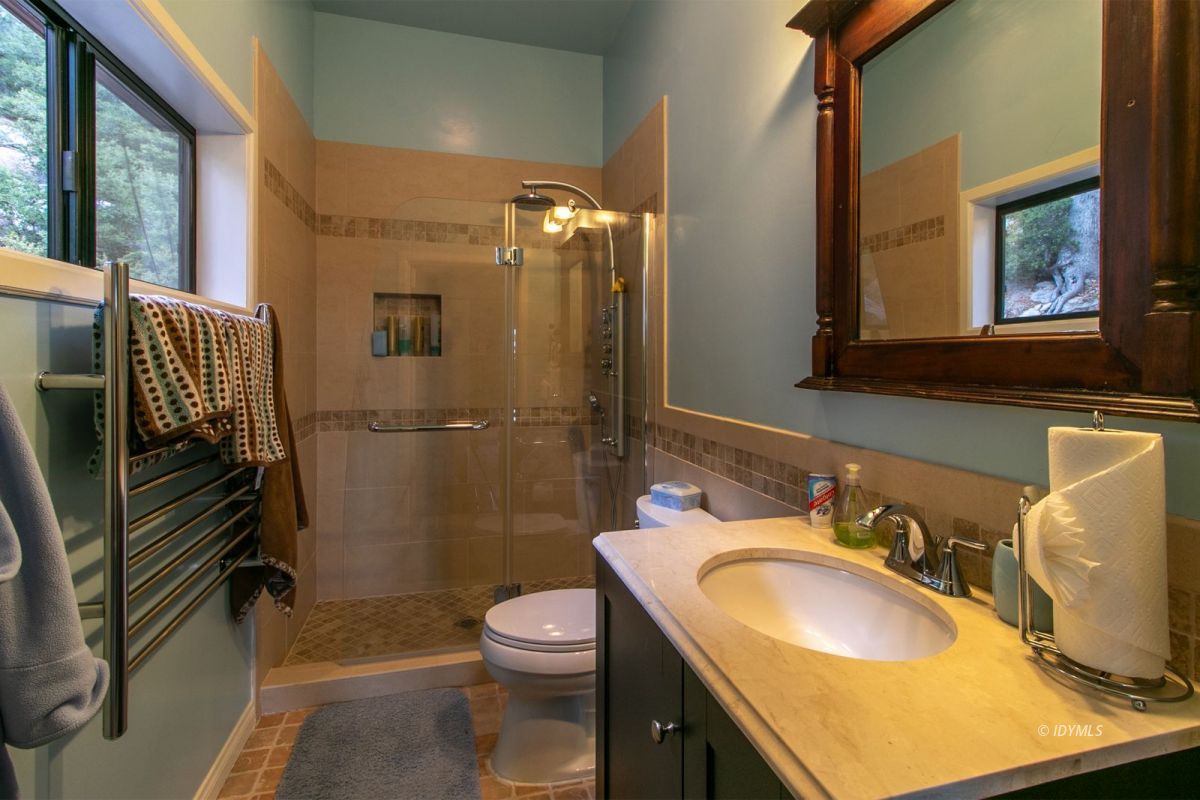 54850 Chipmunk Drive Idyllwild, CA 92549 - Photo 41 of 44 a bathroom with a sink toilet and shower