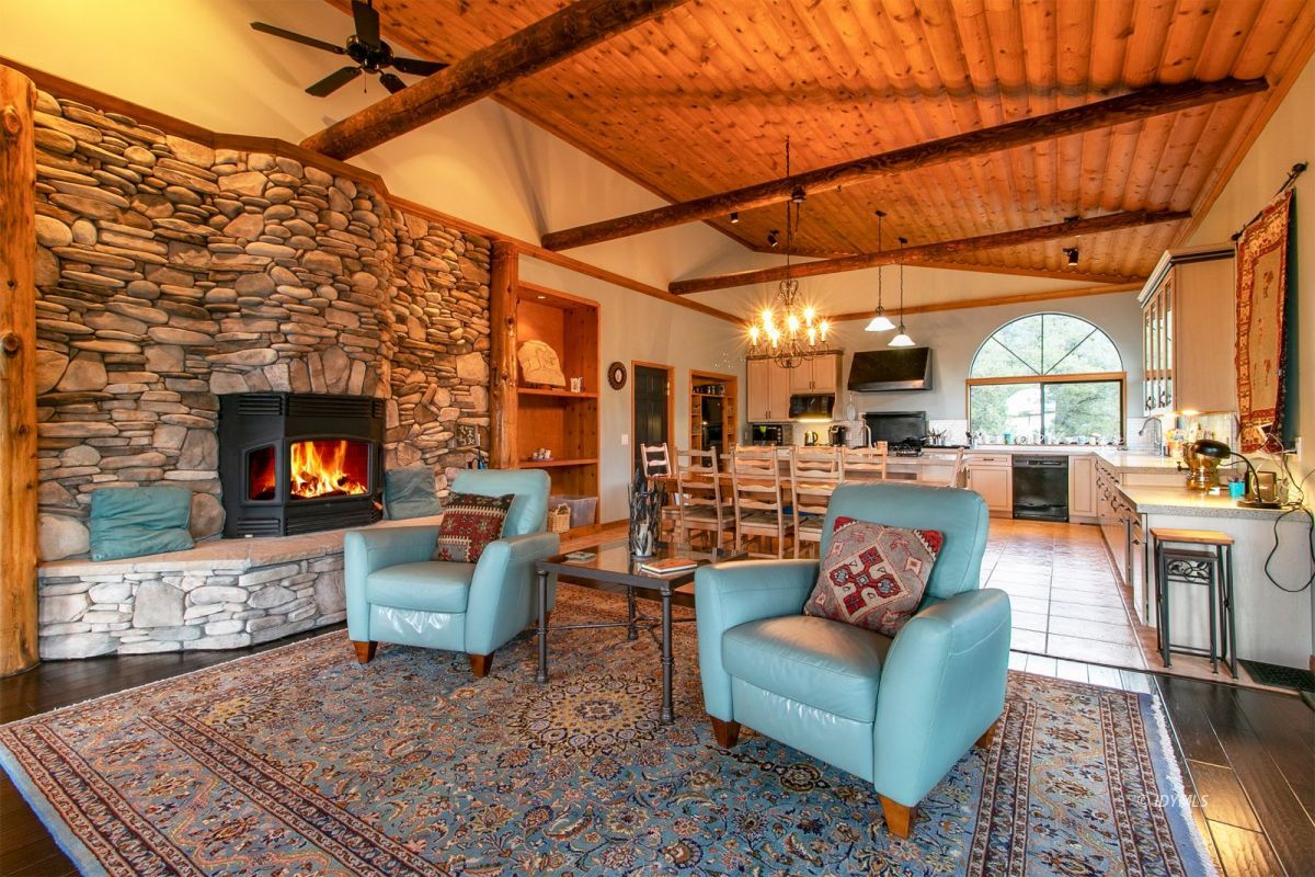 54850 Chipmunk Drive Idyllwild, CA 92549 - Photo 10 of 44 a living room with furniture and a fireplace