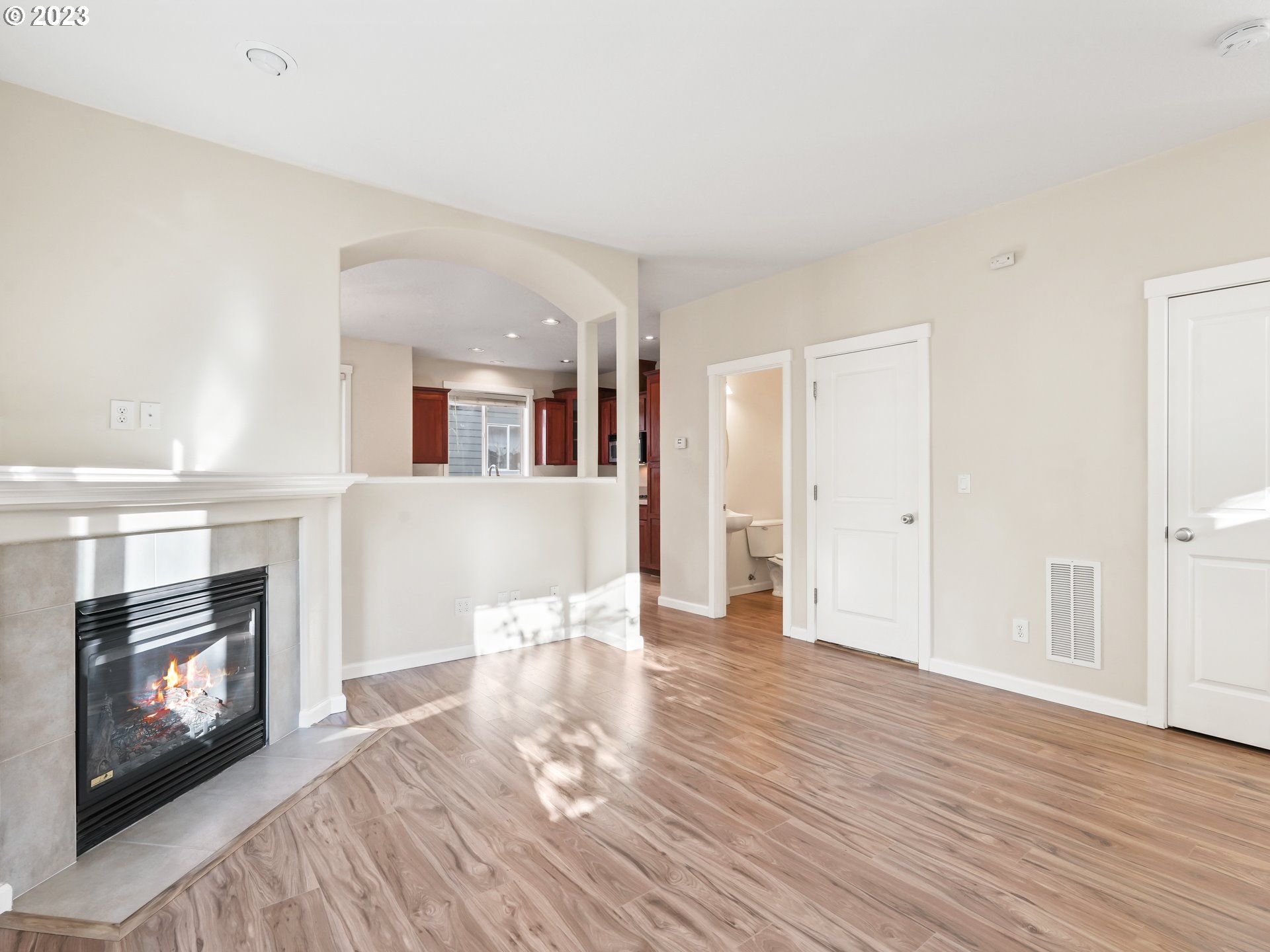 1253 Southwest 162nd Avenue Beaverton, OR 97006 - Photo 11 of 48 a view of a livingroom with wooden floor and a fireplace