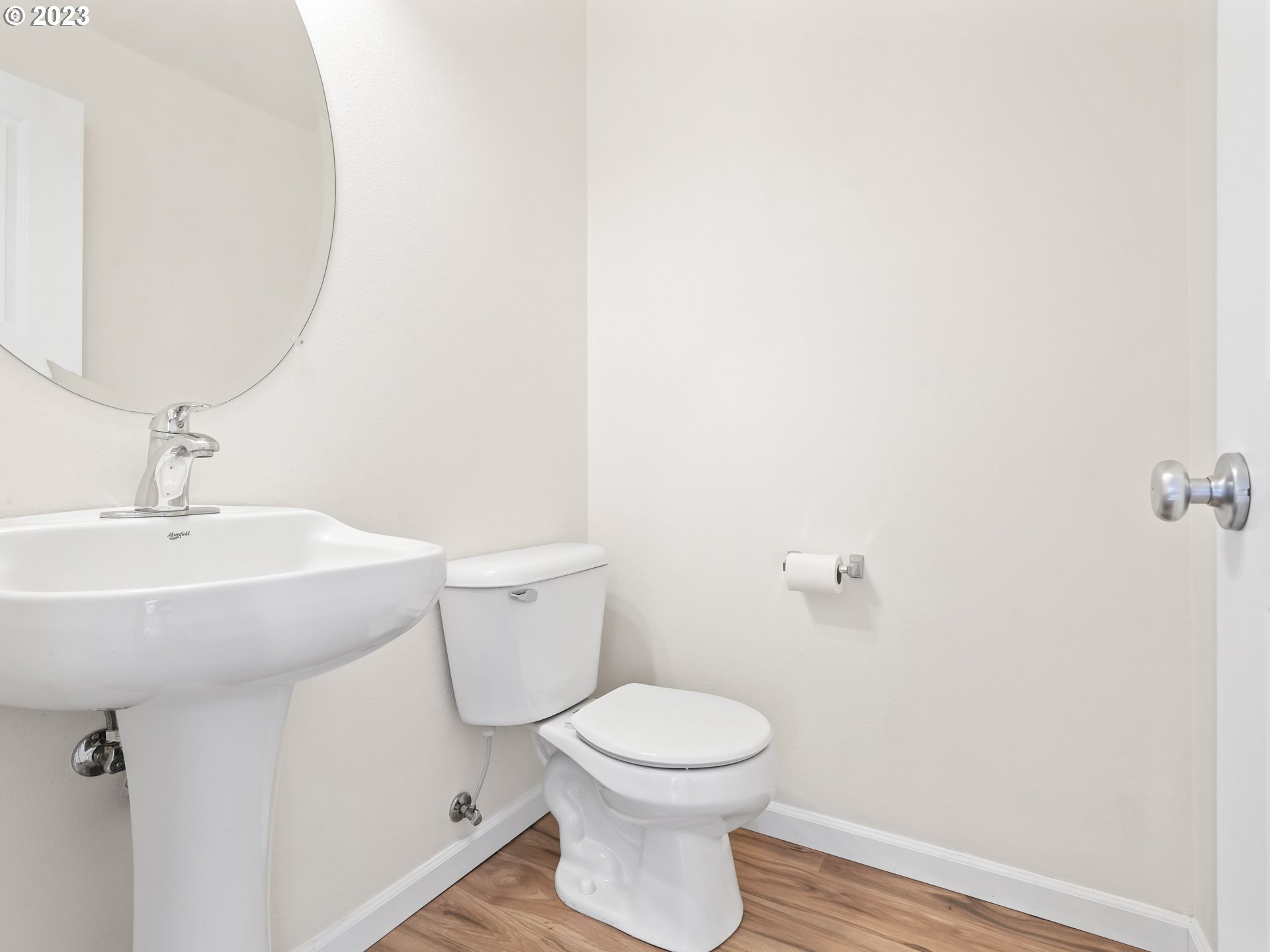 1253 Southwest 162nd Avenue Beaverton, OR 97006 - Photo 24 of 48 a bathroom with a toilet a sink and mirror