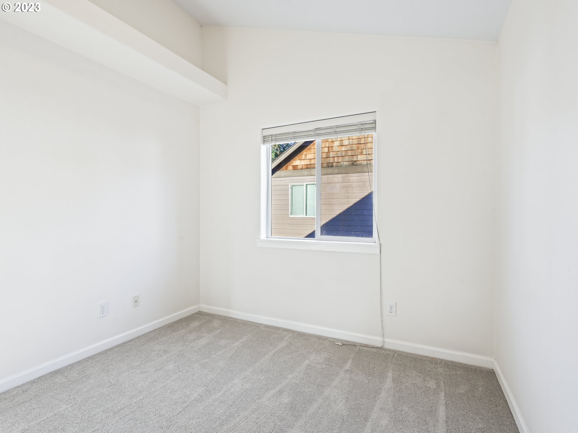 1253 Southwest 162nd Avenue Beaverton, OR 97006 - Photo 29 of 48 an empty room with a window