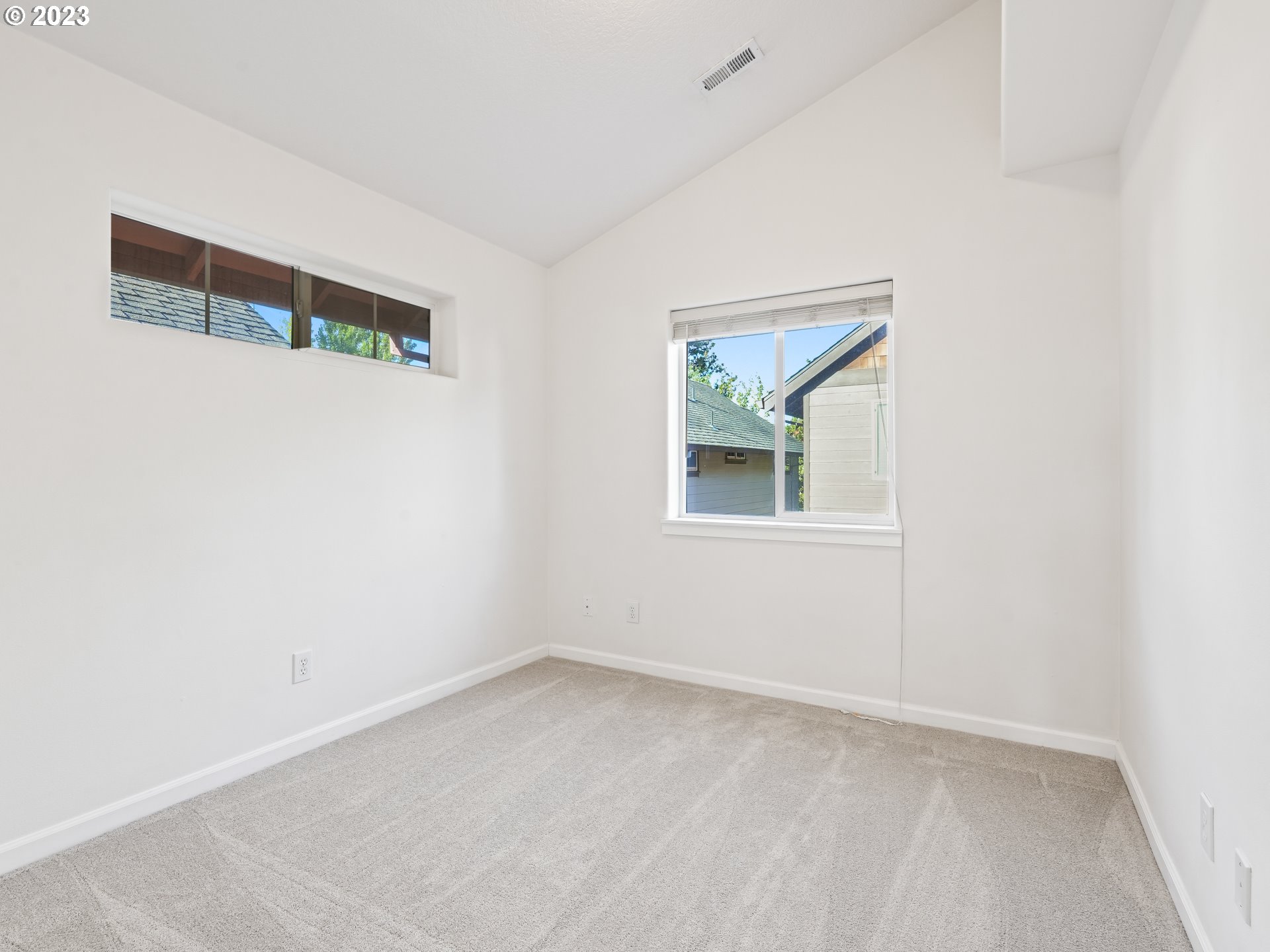 1253 Southwest 162nd Avenue Beaverton, OR 97006 - Photo 32 of 48 an empty room with a window