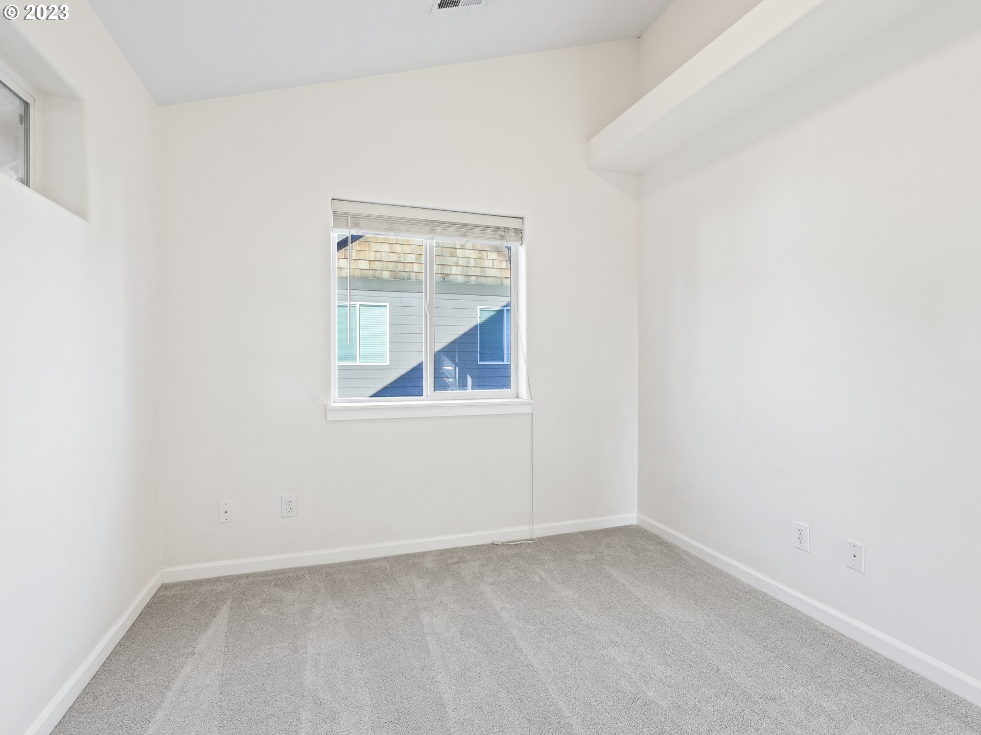 1253 Southwest 162nd Avenue Beaverton, OR 97006 - Photo 33 of 48 an empty room with a window