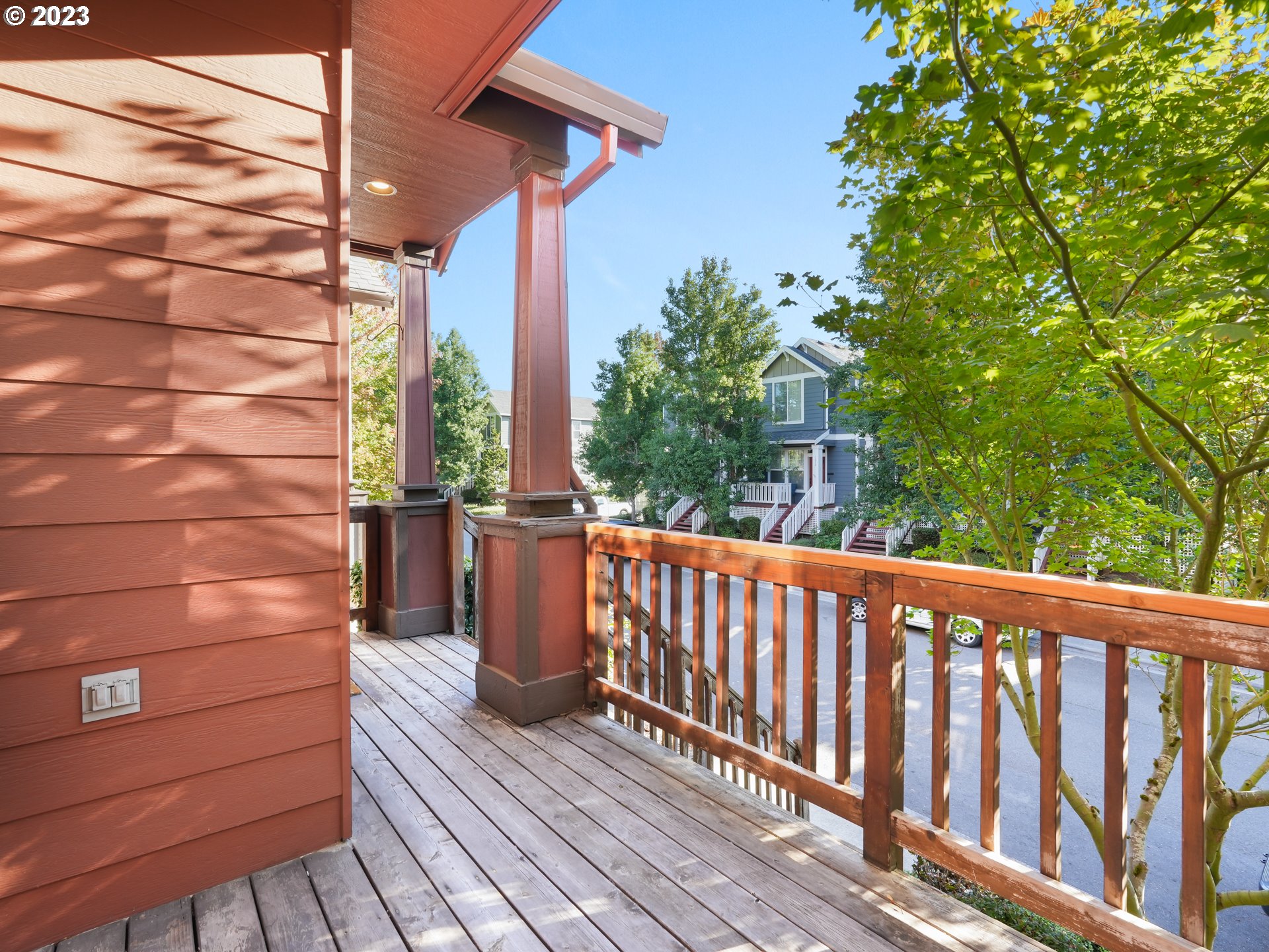 1253 Southwest 162nd Avenue Beaverton, OR 97006 - Photo 5 of 48 a view of balcony with wooden floor and outdoor seating
