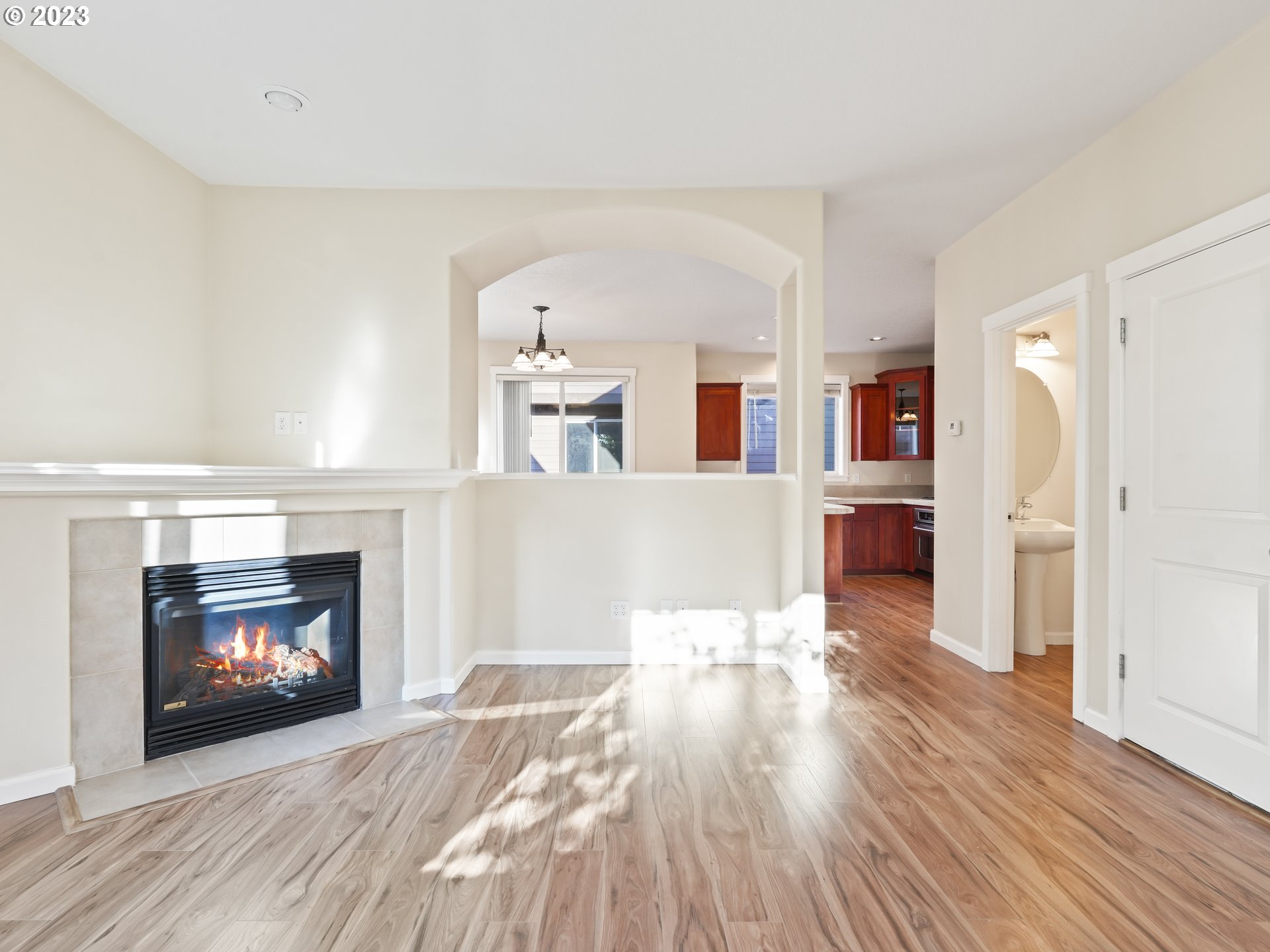1253 Southwest 162nd Avenue Beaverton, OR 97006 - Photo 8 of 48 a living room with furniture and a fireplace
