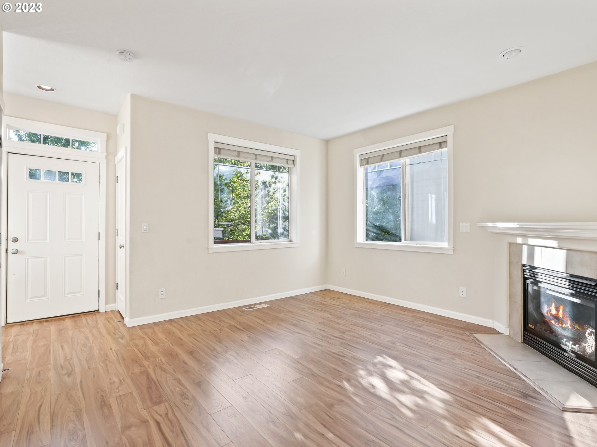 1253 Southwest 162nd Avenue Beaverton, OR 97006 - Photo 10 of 48 wooden floor in an empty room with a window