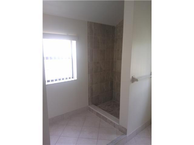 6170 Vía Tierra Boca Raton, FL 33433 - Photo 12 of 17 a bathroom with a toilet