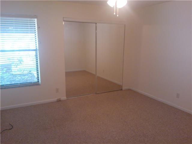 6170 Vía Tierra Boca Raton, FL 33433 - Photo 4 of 17 an empty room with windows