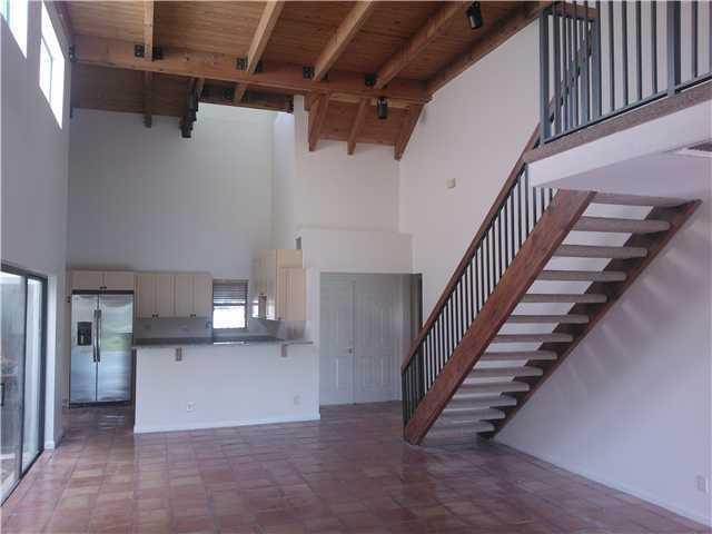 6170 Vía Tierra Boca Raton, FL 33433 - Photo 6 of 17 a view of hallway with stairs and wooden floor