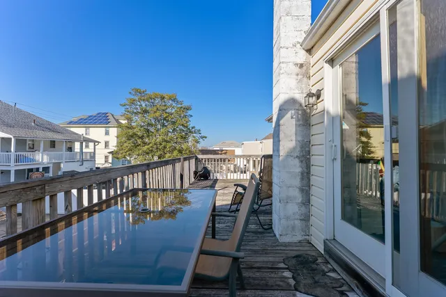 a view of balcony with furniture