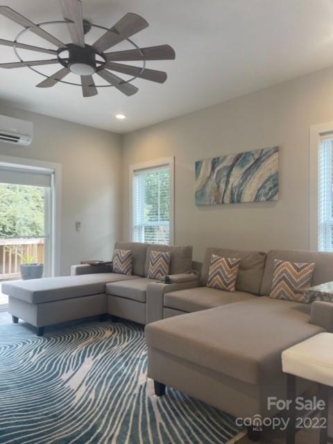 3047 Ridge Avenue Charlotte, NC 28208 - Photo 15 of 38 a living room with furniture and a window