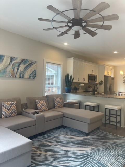 3047 Ridge Avenue Charlotte, NC 28208 - Photo 17 of 38 a living room with furniture kitchen view and a window