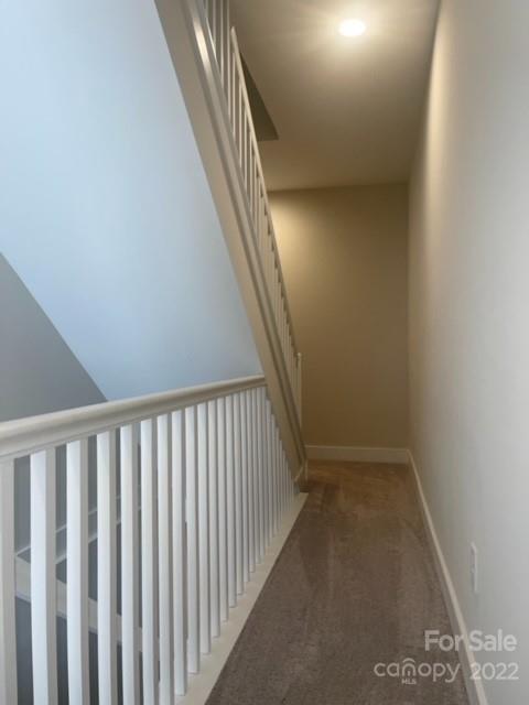 3047 Ridge Avenue Charlotte, NC 28208 - Photo 28 of 38 a view of staircase with railing and white walls
