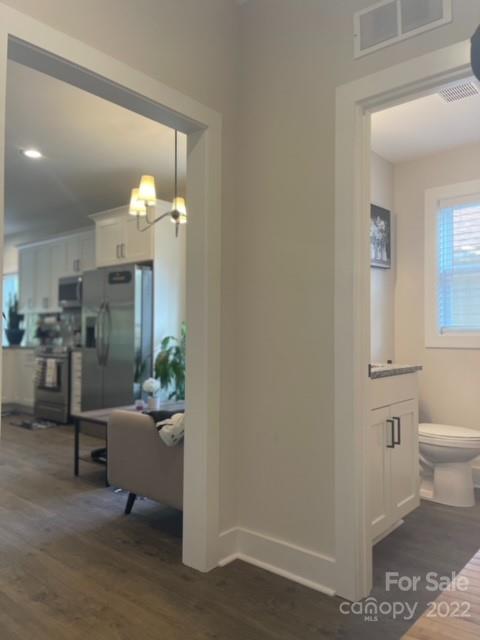 3047 Ridge Avenue Charlotte, NC 28208 - Photo 6 of 38 a living room with furniture and a mirror