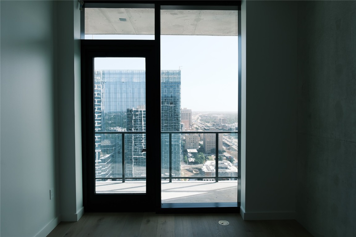 610 Davis Street, Unit 3110 Austin, TX 78701 - Photo 4 of 34 a view of a porch with a floor to ceiling window