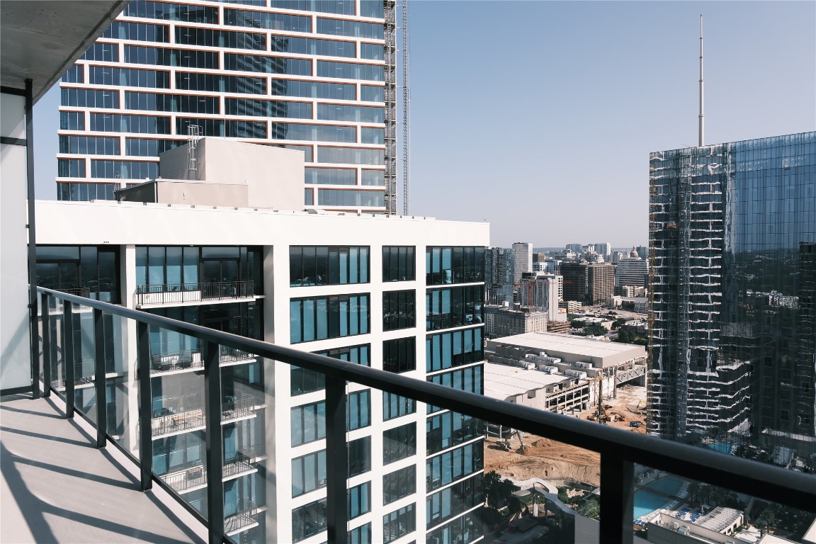 610 Davis Street, Unit 3110 Austin, TX 78701 - Photo 10 of 34 a view of a building from a balcony