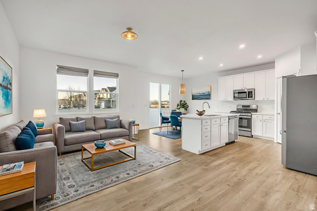 1058 Lilac Way Mapleton, UT 84664 - Photo 2 of 28 Virtually staged Living room with recessed lighting and light wood-style floors