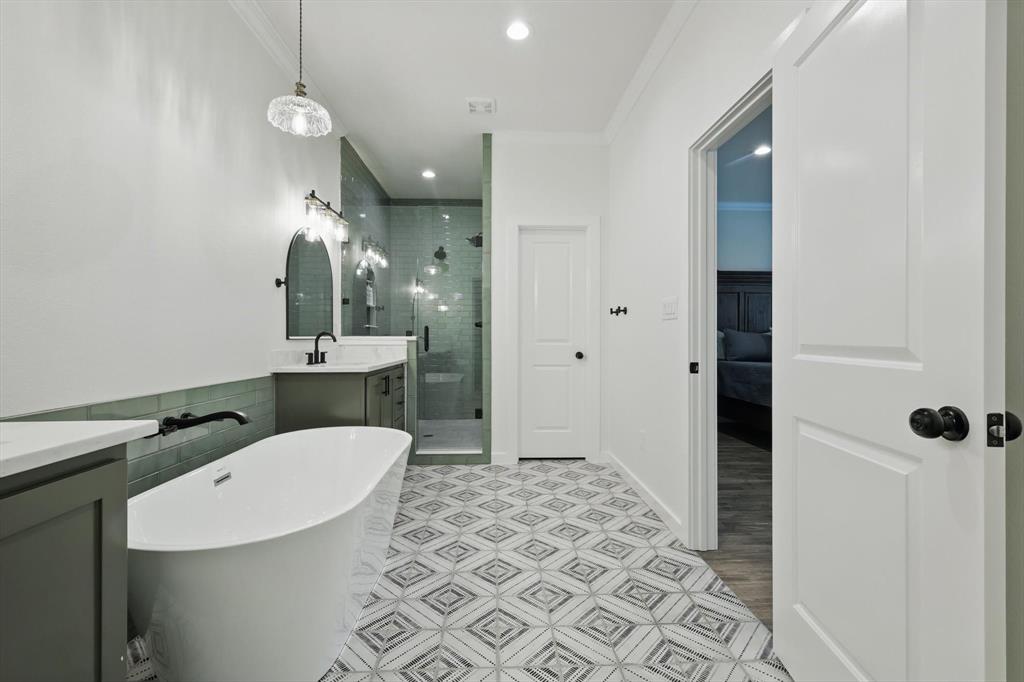 2446 Neely Trail Valley View, TX 76272 - Photo 15 of 29 a bathroom with a sink a toilet a mirror and shower