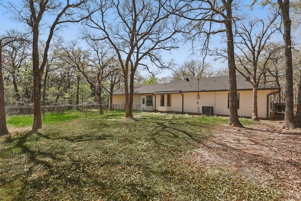 2446 Neely Trail Valley View, TX 76272 - Photo 26 of 29 a view of a house with a yard