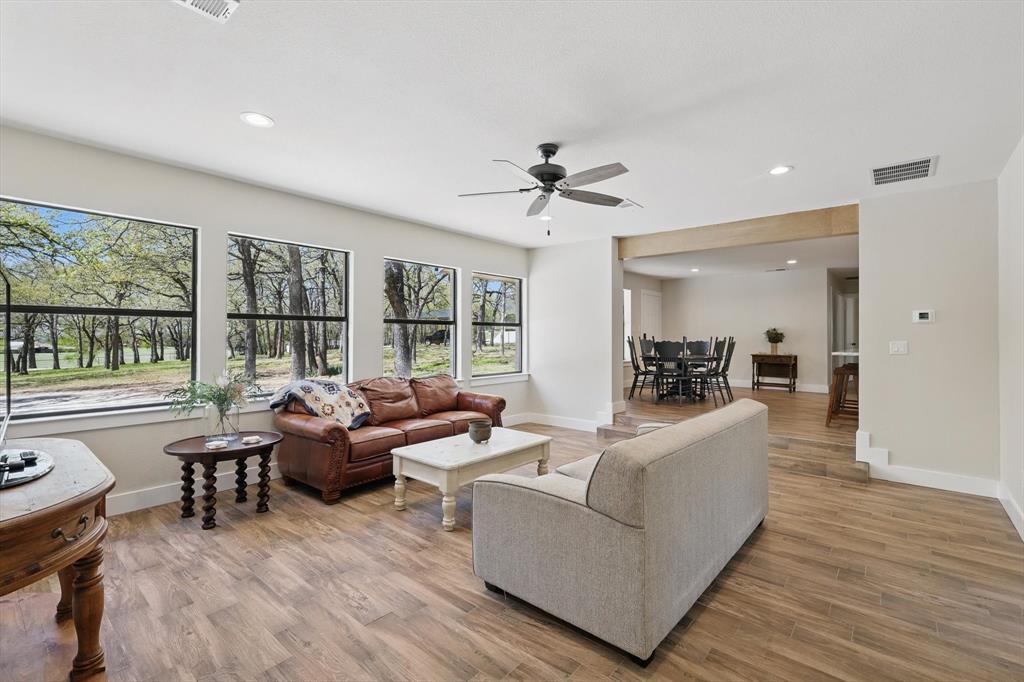 2446 Neely Trail Valley View, TX 76272 - Photo 9 of 29 a living room with furniture and a large window