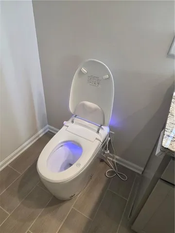 a white bath tub sitting in a bathroom