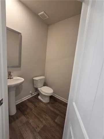 a front view of a house with garage