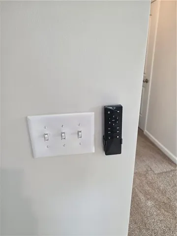 a view of a house with a yard and sitting area