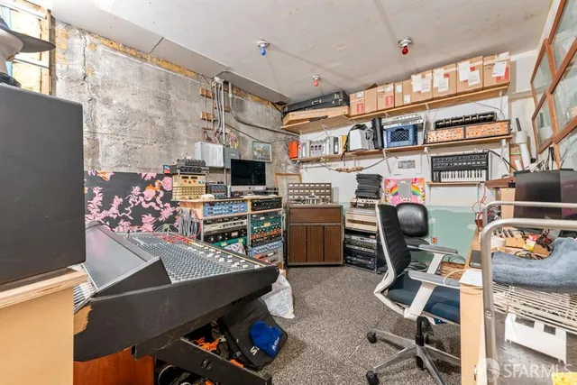 a bed room with a bed and a couch