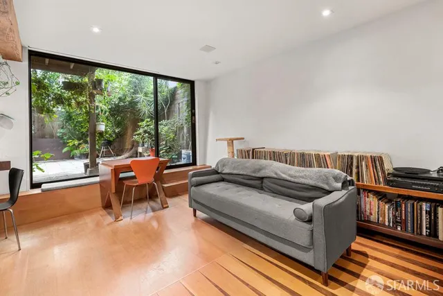 a outdoor dining space with furniture and a potted plant