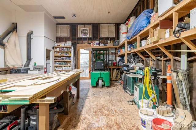 a view of a chairs and table in a patio