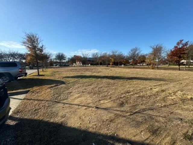 a view of a road with an ocean view